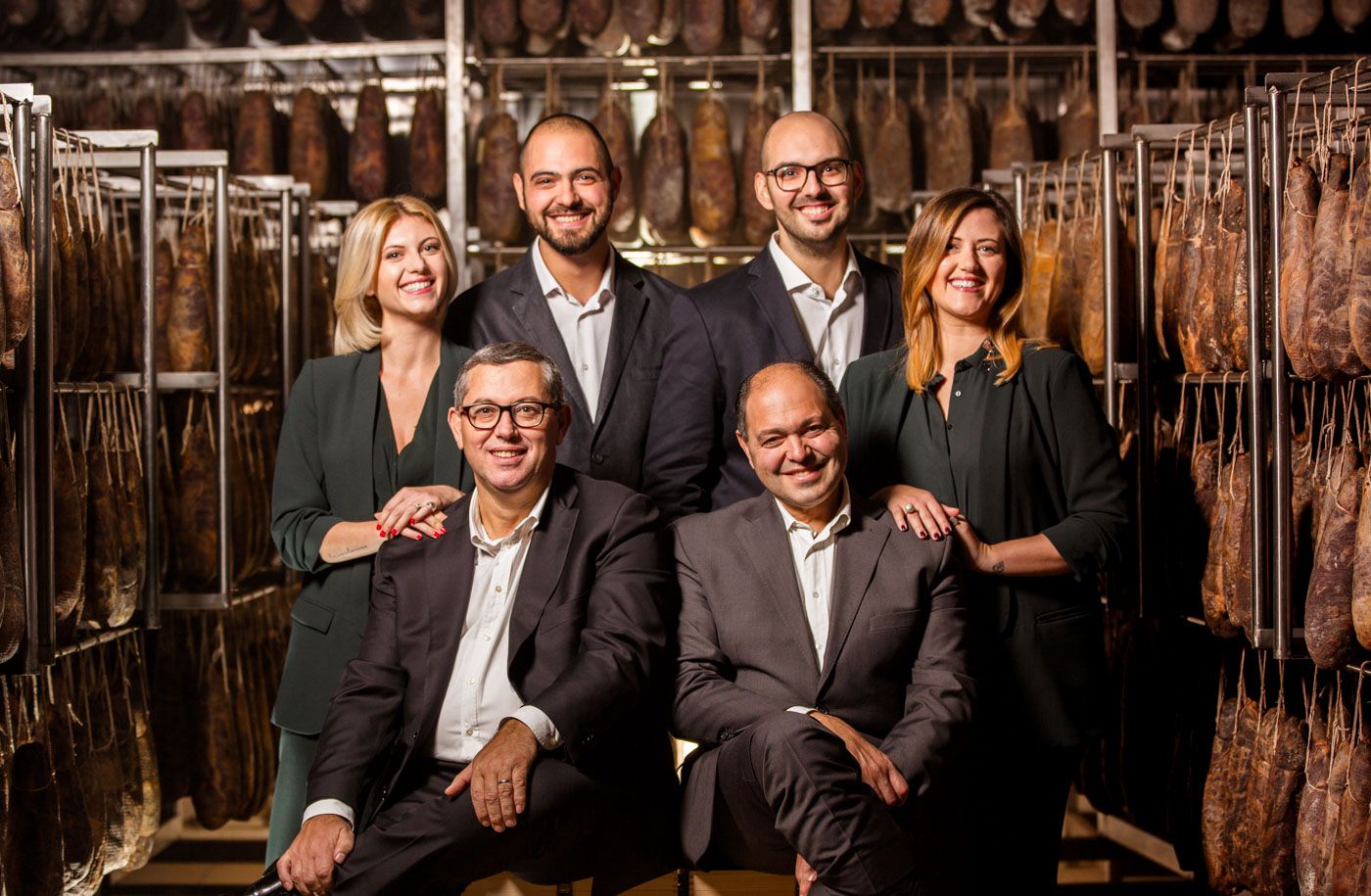 Photo portrait of the owners and founders of Salumificio Santoro
