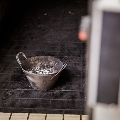 Smoking bucket with burning Fragno branches