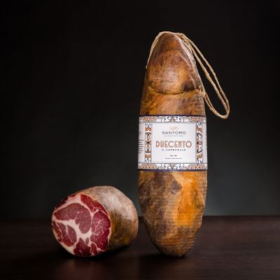 Whole and sliced piece of Santoro Capocollo Duecento