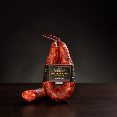 Whole and sliced piece of Santoro spicy stirred Salami